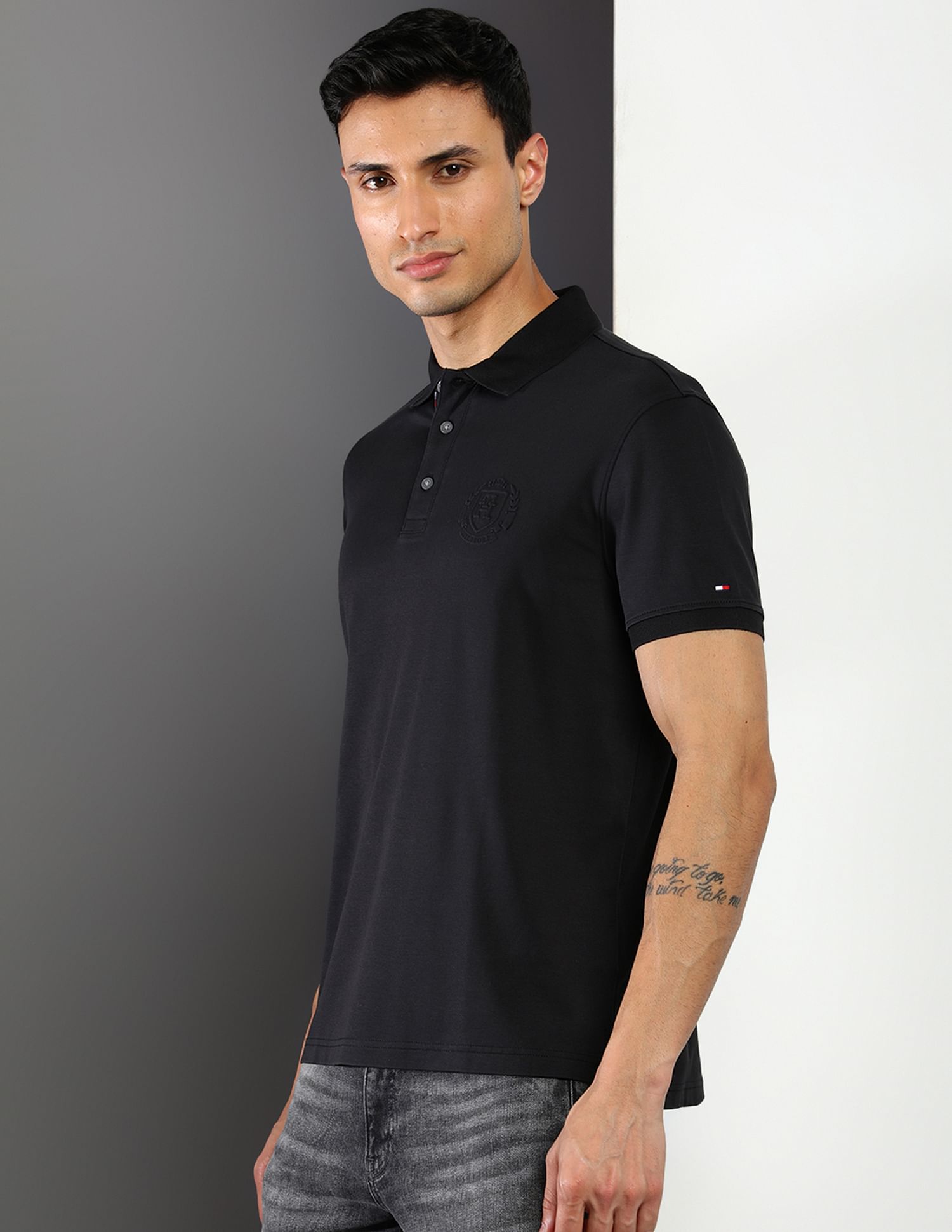 Tommy hilfiger black polo hot sale