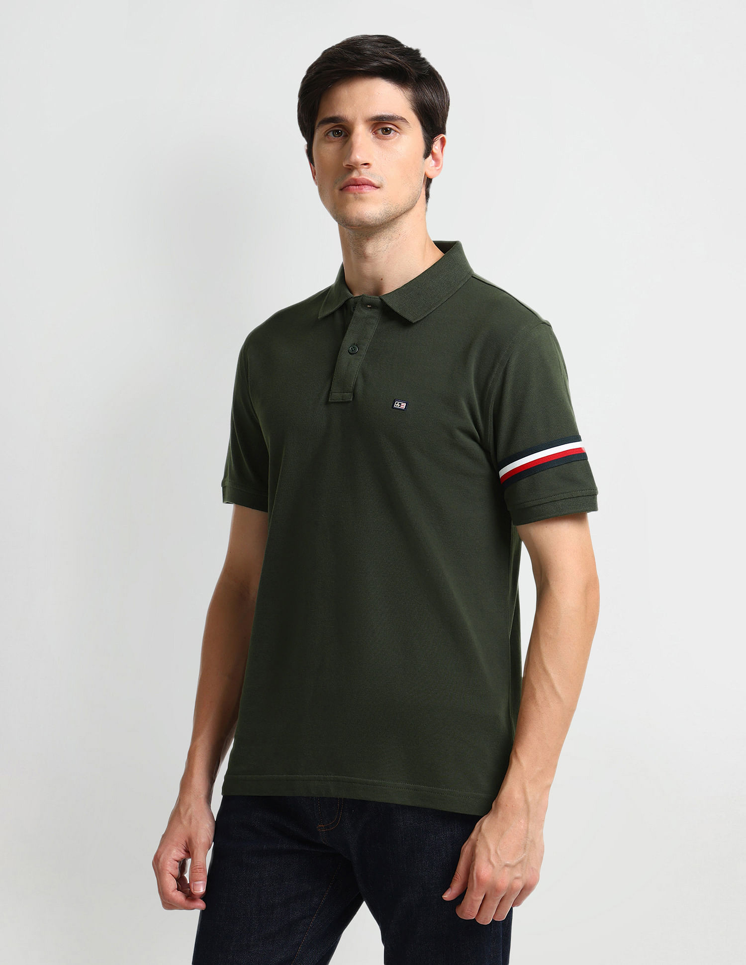 Arrow Sports Striped Tape Solid Polo Shirt