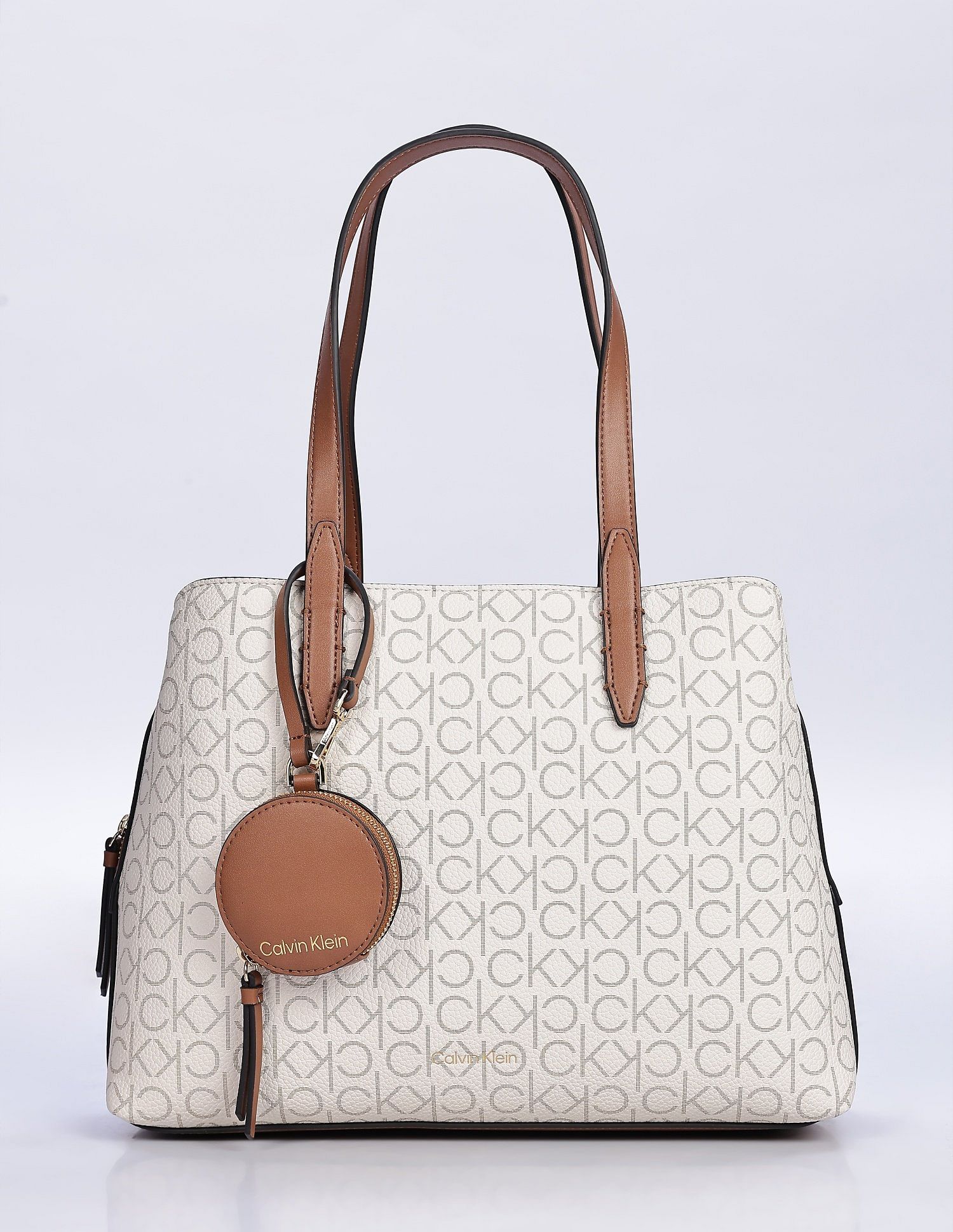 Calvin Klein Printed Beige Pvc Hand Bags