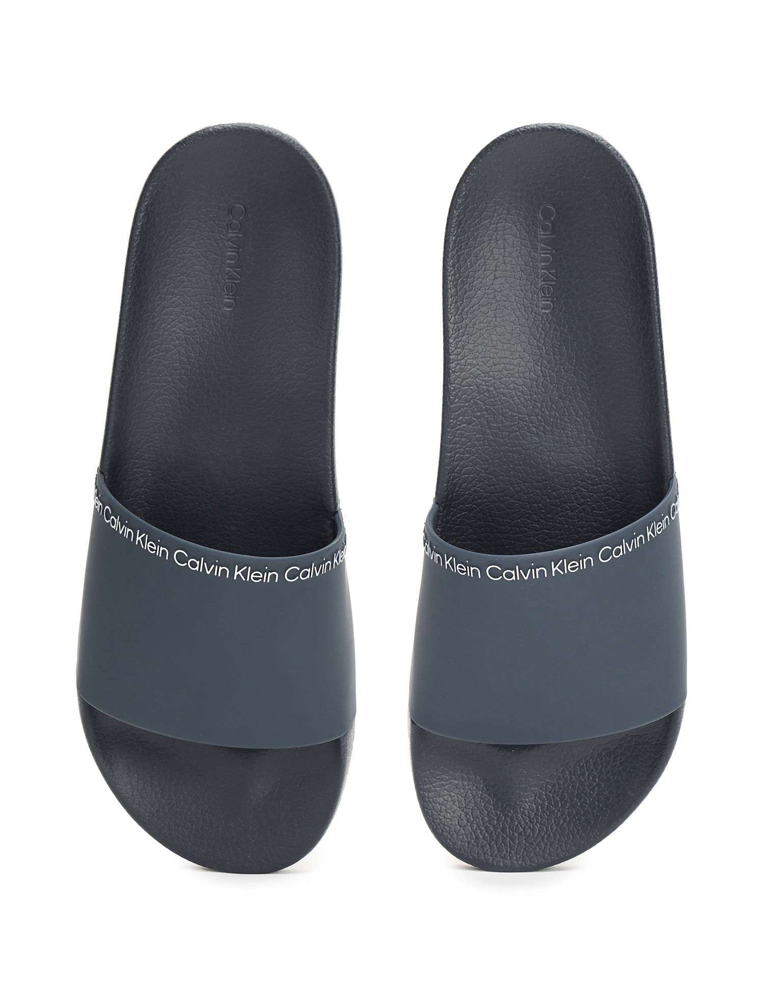 Buy Calvin Klein Men Solid Pool Slides NNNOW