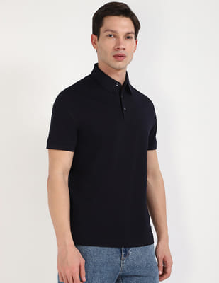 トップス tdk_void polo Buy Tommy Hilfiger Solid Regular Fit Polo - NNNOW.com