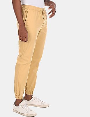 beige joggers mens