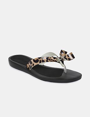 guess black flip flops with bow