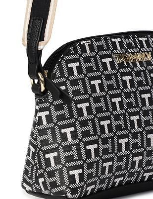 TOMMY HILFIGERnJulia shops Coated Canvas Sling Backpack