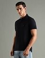 Tommy Hilfiger Solid Regular Fit Cotton Polo T-Shirt
