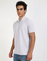Calvin Klein Jeans Solid Regular-Fit Cotton Polo T-Shirt