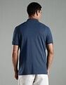 Tommy Hilfiger Solid Regular Fit Cotton Polo T-Shirt