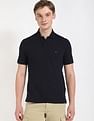 Tommy Hilfiger Solid Regular-Fit Cotton Polo Shirt