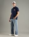 Tommy Hilfiger Solid Regular Fit Cotton Polo T-Shirt